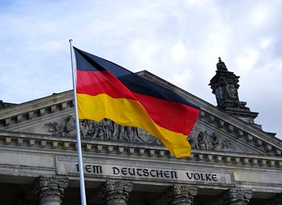 germany flag in front of building